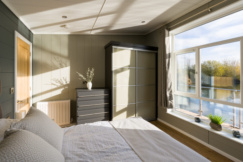 The main bedroom in a residential floating lodge